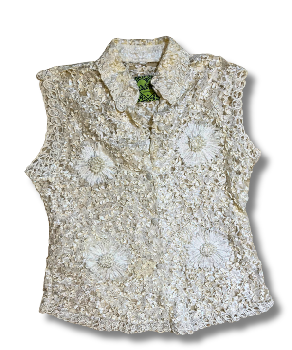Blusa beige con textura floral
